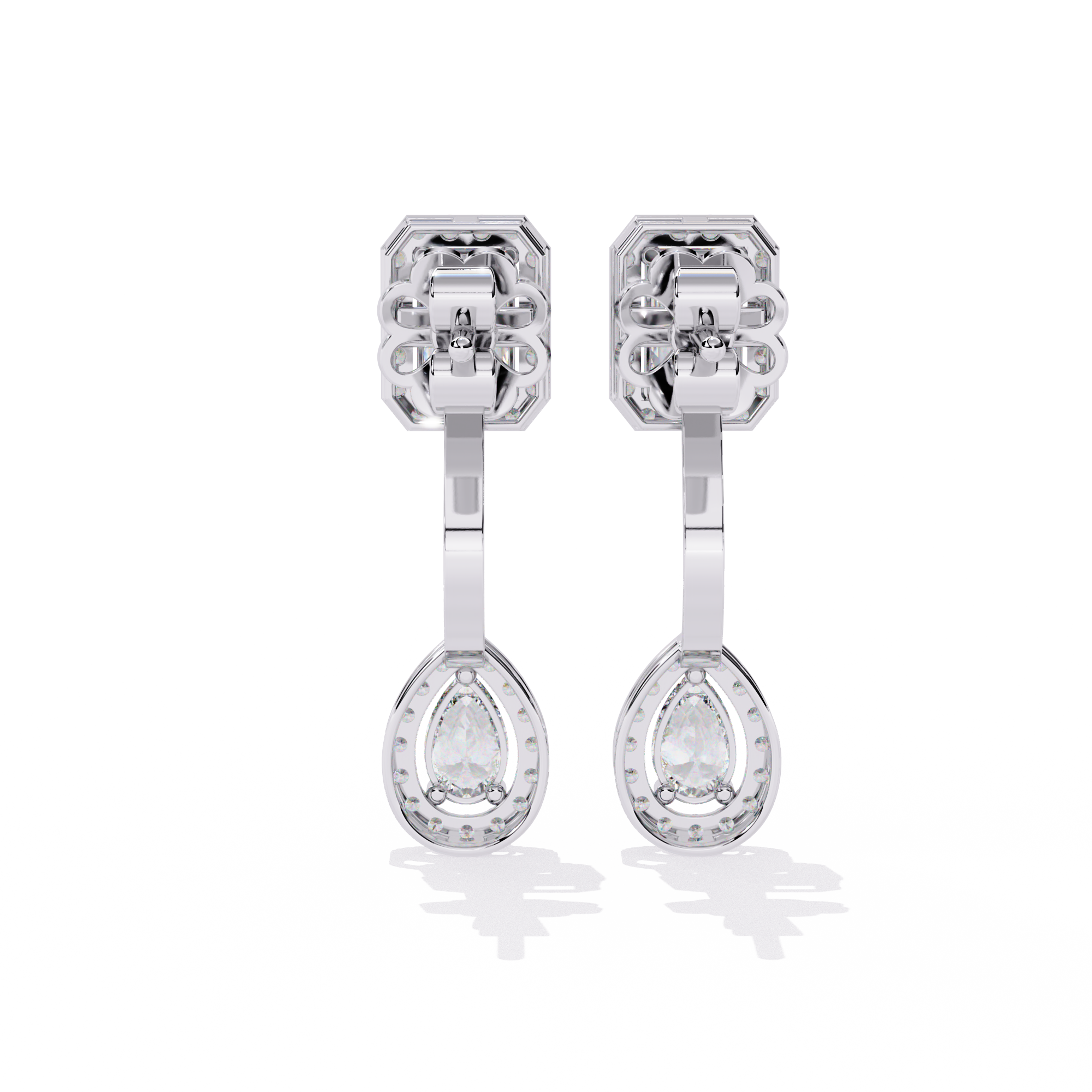 Elegant Diamond Earrings with Emerald and Pear Cut Stones"
