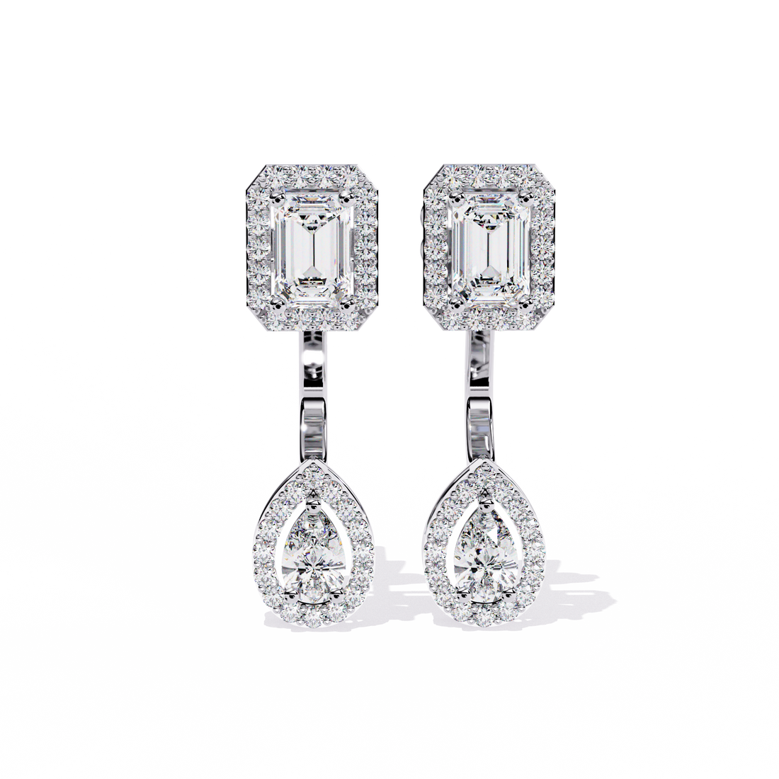 Elegant Diamond Earrings with Emerald and Pear Cut Stones"