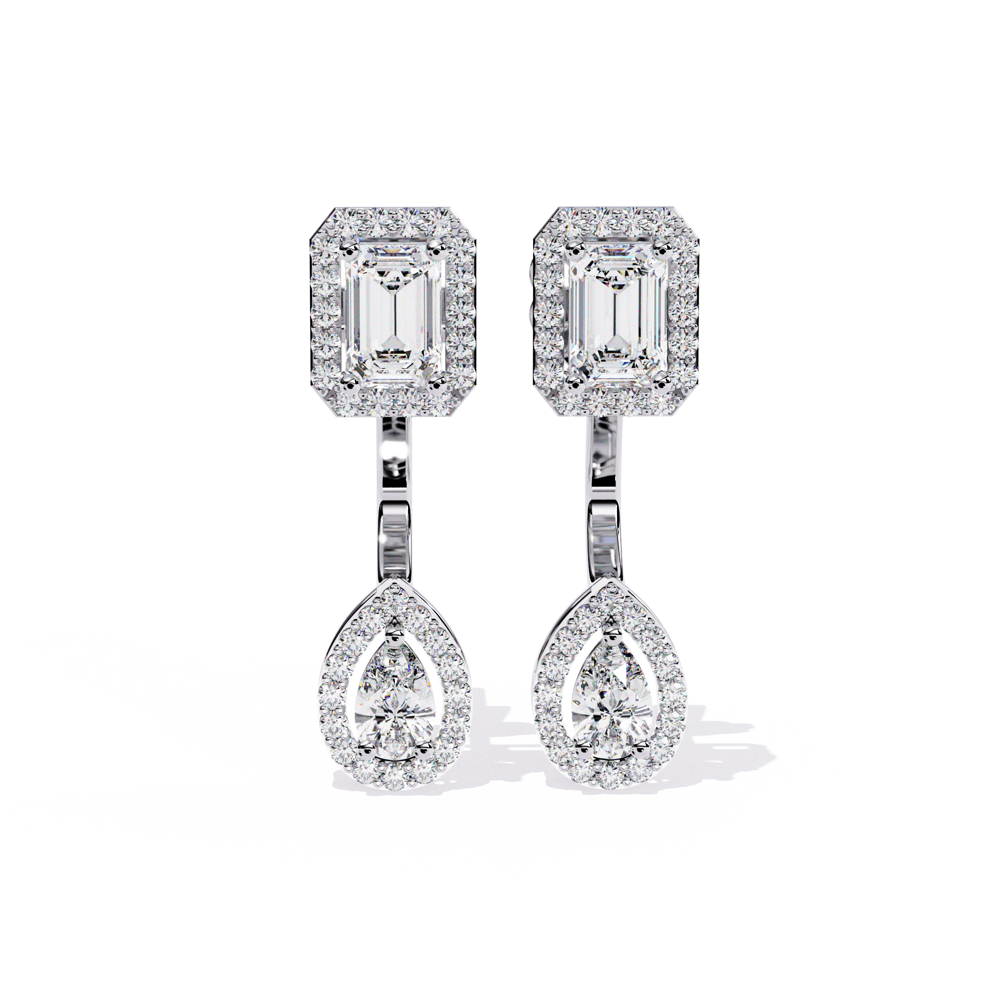 Elegant Diamond Earrings with Emerald and Pear Cut Stones"