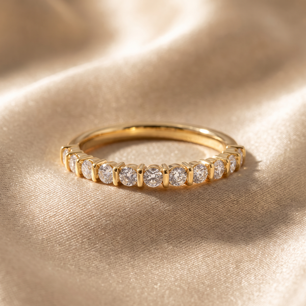 The Sovereign Round Bar Channel Solitaire Ring