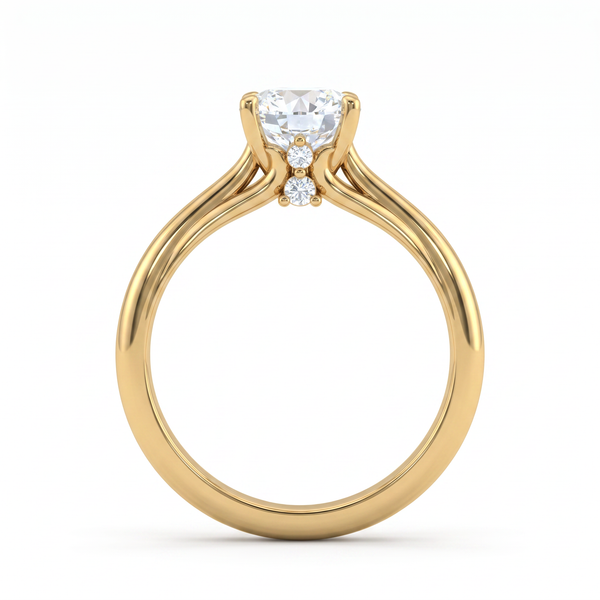 A yellow gold solitaire engagement ring featuring a round brilliant-cut center stone and three small accent diamonds, shown on a clean white background.