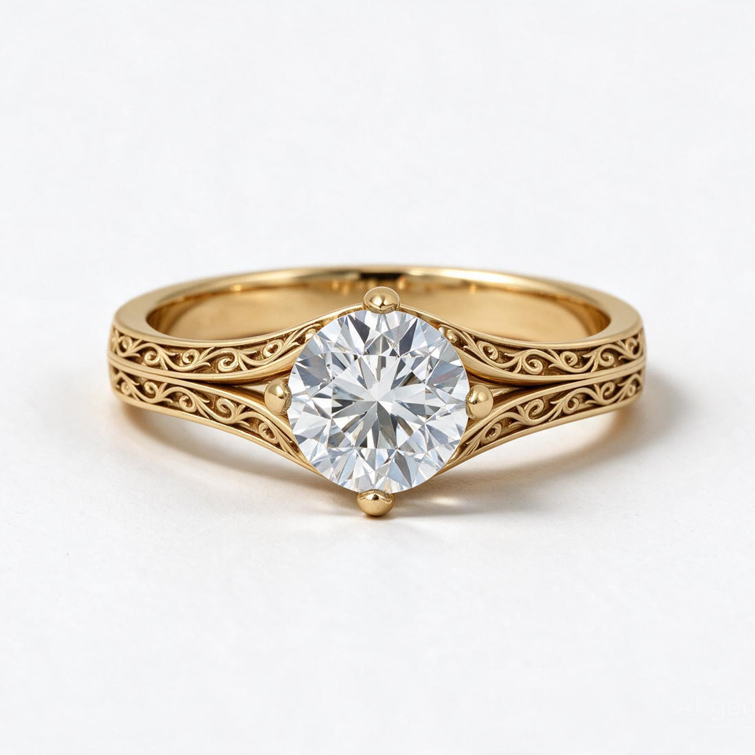 A yellow gold solitaire engagement ring with an intricate filigree band and a round brilliant-cut diamond center stone, shown on a clean white background.