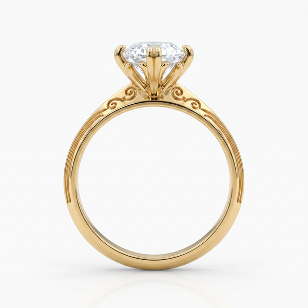 A yellow gold solitaire engagement ring with a round brilliant-cut diamond set in a four-prong crown, shown on a clean white background.