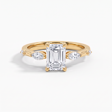 The Marquise Accent Three-Stone Emerald Diamond Ring