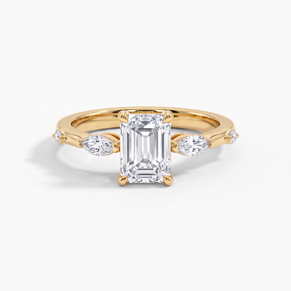 The Marquise Accent Three-Stone Emerald Diamond Ring