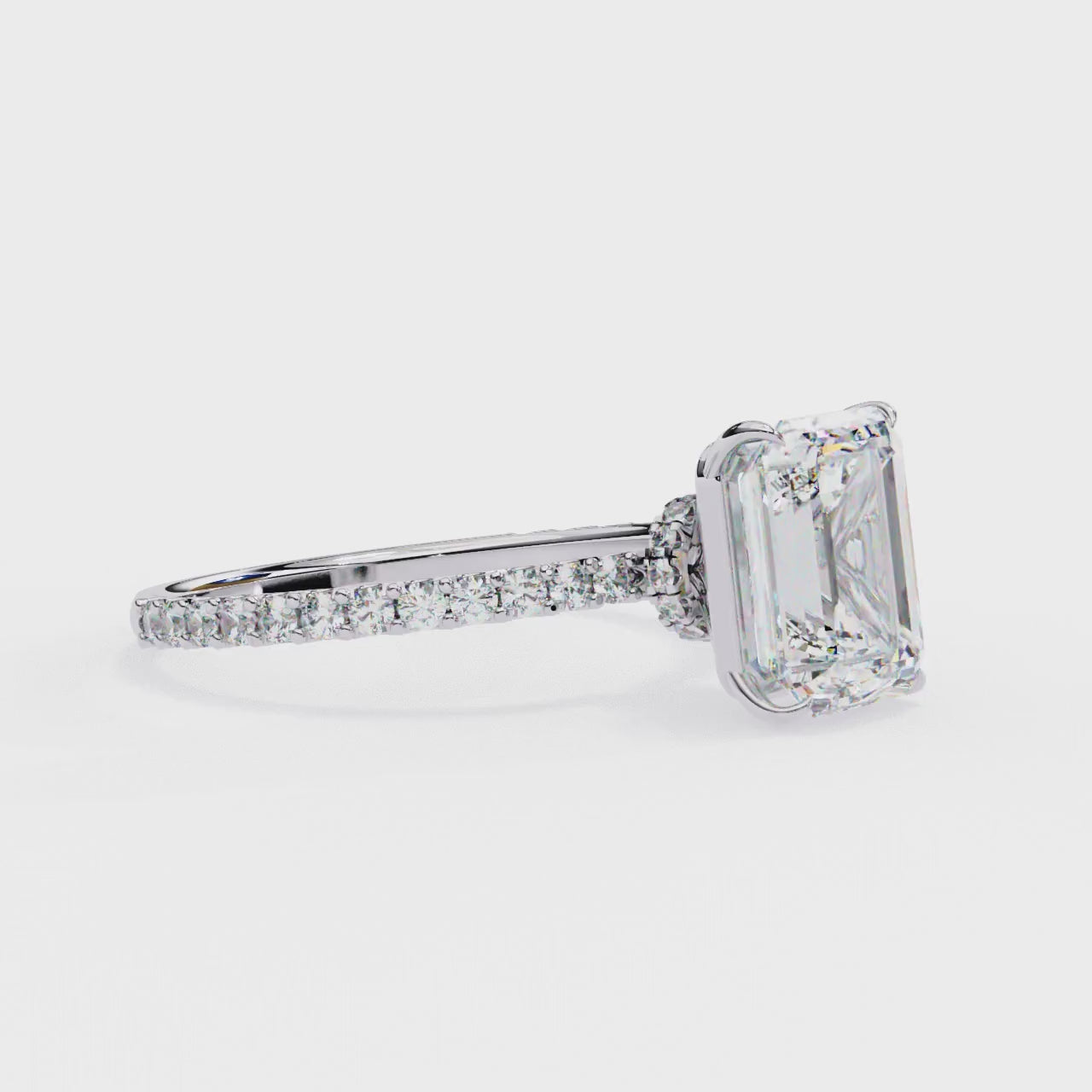 Elegant Emerald Solitaire Diamond Ring with Pave Band