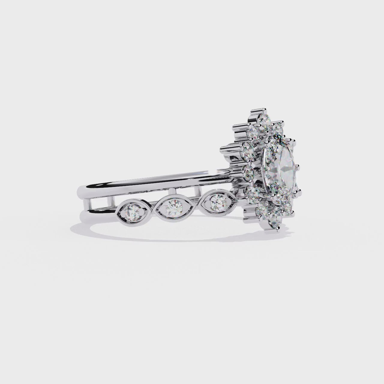 Dainty Oval Solitaire and Diamond Ring