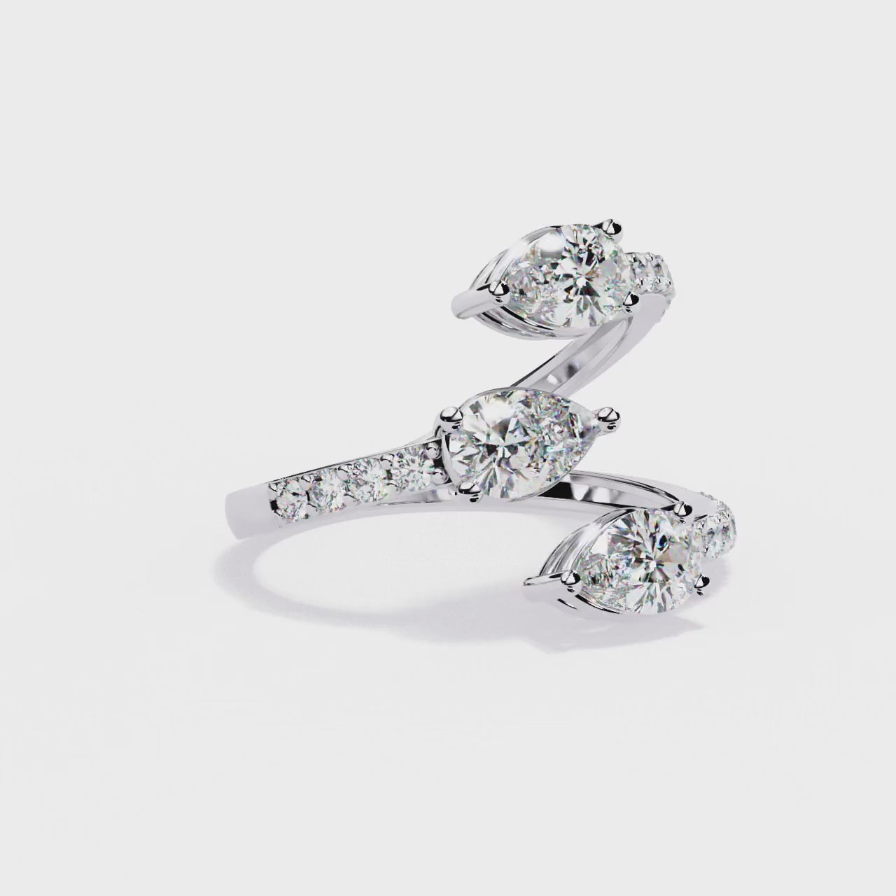 Pear and Round Diamond Twist Ring